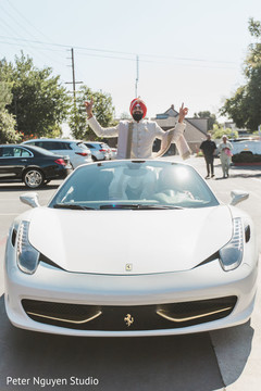 Indian groom on his ferrari going to baraat procession. Indian groom on his ferrari going to baraat procession.