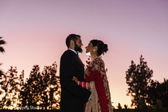 Cheerful Indian bride and groom's photo session. Cheerful Indian bride and groom's photo session.