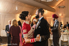 Maharani and raja dancing at Indian wedding reception party. Maharani and raja dancing at Indian wedding reception party.