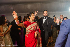 Upbeat Indian couple's dance performance. Upbeat Indian couple's dance performance.