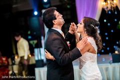 Indian bride dancing with her father at reception. Indian bride dancing with her father at reception.