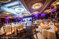Indian wedding reception purple and blue lights decor. Indian wedding reception purple and blue lights decor.