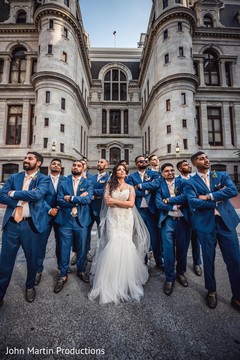 Maharani with groomsmen posing outdoors. Maharani with groomsmen posing outdoors.