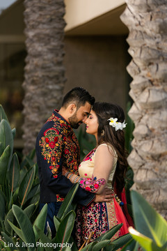 Indian couple sharing a moment surrounded by nature Indian couple sharing a moment surrounded by nature