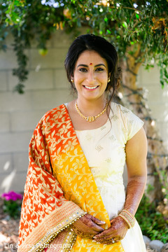 Indian bride smiles before the pre-wedding celebrations Indian bride smiles before the pre-wedding celebrations