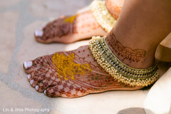 Maharani's henna stained feet with tumeric paste over them Maharani's henna stained feet with tumeric paste over them