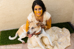 Maharani petting her dog after the Gaye Holud Maharani petting her dog after the Gaye Holud