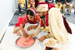 Indian bride and groom at the milk ritual. Indian bride and groom at the milk ritual.