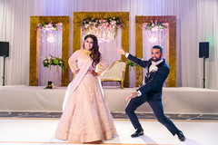 Indian couple posing at reception stage. Indian couple posing at reception stage.