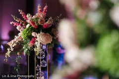 Pink and white Indian wedding table flowers decorations. Pink and white Indian wedding table flowers decorations.