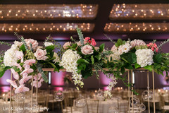 Pink, white and green Indian wedding table flowers centerpiece. Pink, white and green Indian wedding table flowers centerpiece.