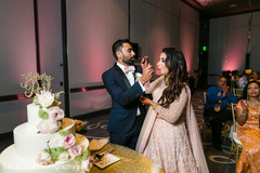 Indian couple sharing cake. Indian couple sharing cake.