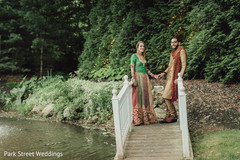 Indian couple posing next to river photo session. Indian couple posing next to river photo session.
