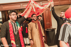 Indian groom making his entrance to pre-wedding party. Indian groom making his entrance to pre-wedding party.