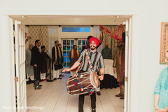 Indian pre-wedding dhol player capture. Indian pre-wedding dhol player capture.