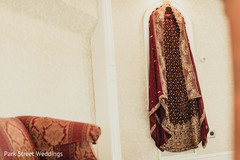 Golden and burgundy ghoonghat and lehenga. Golden and burgundy ghoonghat and lehenga.