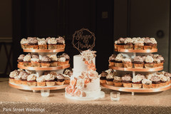 Cupcakes and cake for Indian wedding reception party. Cupcakes and cake for Indian wedding reception party.