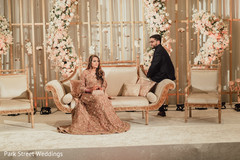Maharani and raja posing at reception stage. Maharani and raja posing at reception stage.