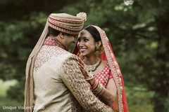 Indian couple looking at each other for photo shoot. Indian couple looking at each other for photo shoot.