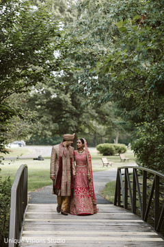 Indian couple walking on the wooden bridge. Indian couple walking on the wooden bridge.