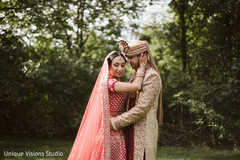 Indian bride holding her groom's face. Indian bride holding her groom's face.