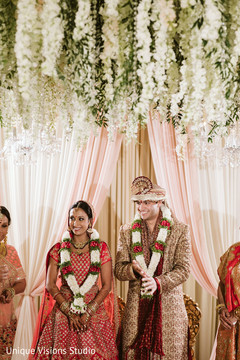 Indian couple smiling in wedding clothes. Indian couple smiling in wedding clothes.