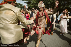 Indian groom dancing during his baraat parade. Indian groom dancing during his baraat parade.