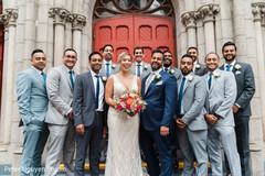 The Indian newlywed couple with the Indian groomsmen The Indian newlywed couple with the Indian groomsmen