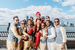 Indian groomsmen lifting the Indian groom Indian groomsmen lifting the Indian groom
