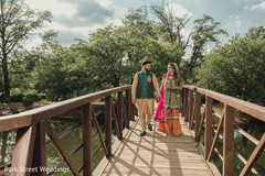 Indian couple holding hands on woodbridge Indian couple holding hands on woodbridge