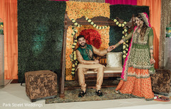 Indian couple in colorful wedding stage Indian couple in colorful wedding stage