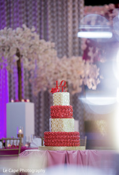Red and golden Indian wedding cake decoration. Red and golden Indian wedding cake decoration.