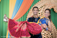 Raja holding bride at sangeet stage. Raja holding bride at sangeet stage.
