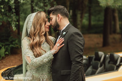 Indian wedding couple about to kiss Indian wedding couple about to kiss