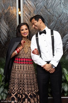 Indian couple on their wedding reception outfits. Indian couple on their wedding reception outfits.