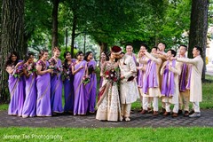 Joyful indian bride and groom with bridesmaids and groomsmen capture. Joyful indian bride and groom with bridesmaids and groomsmen capture.
