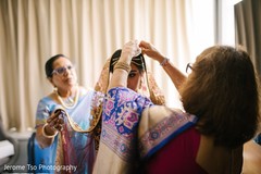 Indian bride getting her wedding ceremony veil. Indian bride getting her wedding ceremony veil.