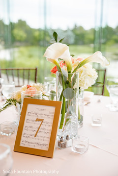 Golden and white Indian wedding table number. Golden and white Indian wedding table number.