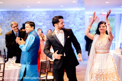 Indian couple dancing at reception entrance. Indian couple dancing at reception entrance.