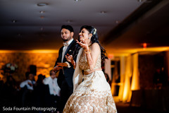 Lovely Indian couple enjoying their first dance capture. Lovely Indian couple enjoying their first dance capture.