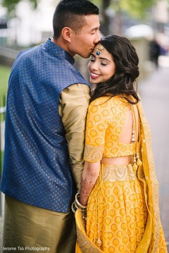 Maharani and raja posing on their sangeet outfits. Maharani and raja posing on their sangeet outfits.