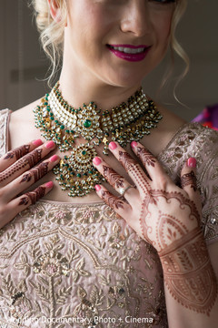 Indian bride wearing her golden kundan necklace. Indian bride wearing her golden kundan necklace.