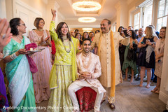 Indian groom holding the coconut at milni. Indian groom holding the coconut at milni.