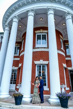 Indian newlyweds outside of the reception venue Indian newlyweds outside of the reception venue