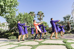 Indian groom dancing outdoors with groomsmen. Indian groom dancing outdoors with groomsmen.
