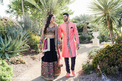 Indian couple walking outdoors holding hands. Indian couple walking outdoors holding hands.