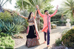 Indian bride and groom wearing sangeet outfits. Indian bride and groom wearing sangeet outfits.