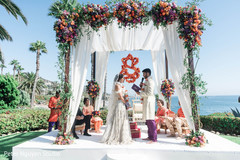 Indian groom saying his vows to bride. Indian groom saying his vows to bride.