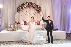 Indian bride and groom at wedding reception stage. Indian bride and groom at wedding reception stage.