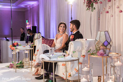 Indian bride and groom at wedding reception stage. Indian bride and groom at wedding reception stage.